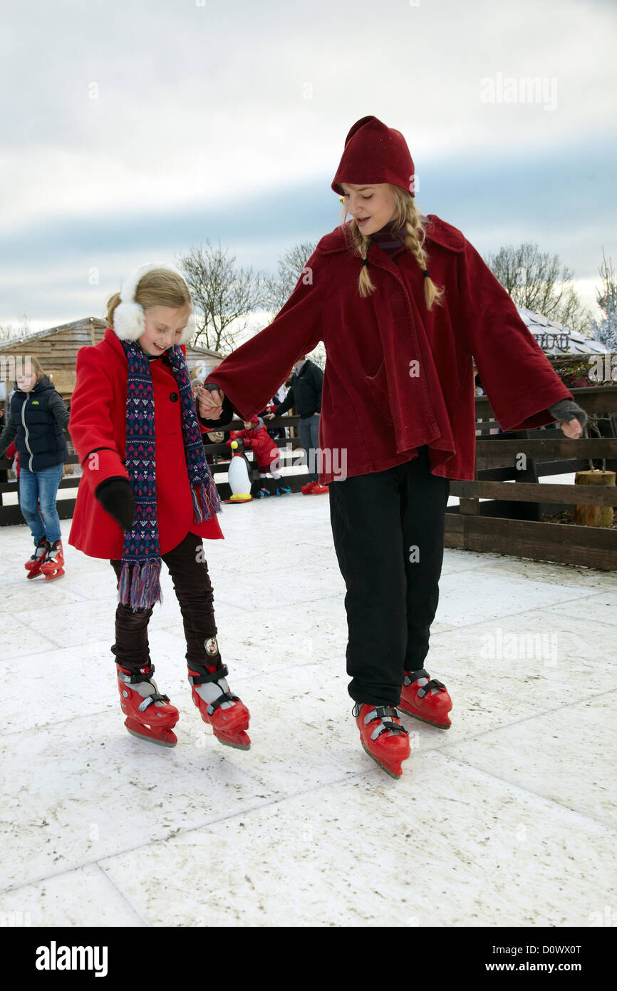Skating on the outdoor ice rink, in the Elf village. Lapland UK, Bewl