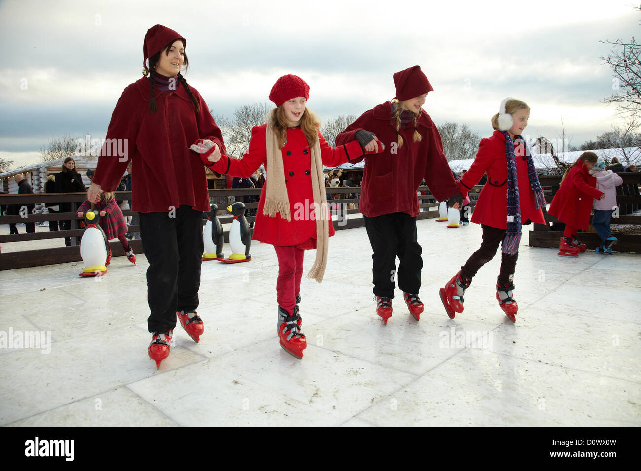 Skating on the outdoor ice rink, in the Elf village. Lapland UK, Bewl