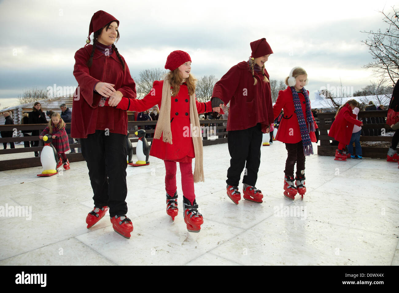 Skating on the outdoor ice rink, in the Elf village. Lapland UK, Bewl