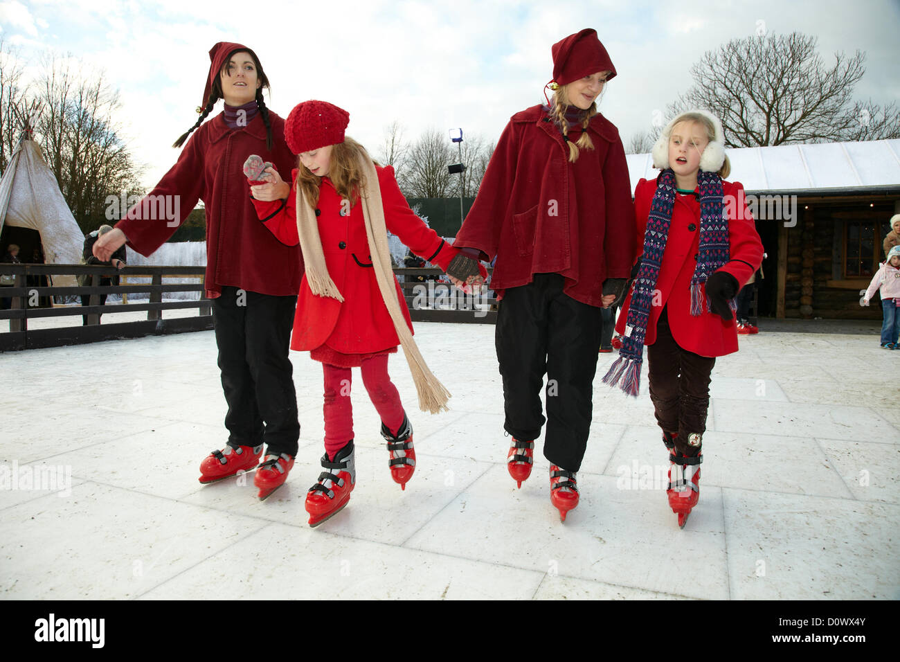 Skating on the outdoor ice rink, in the Elf village. Lapland UK, Bewl