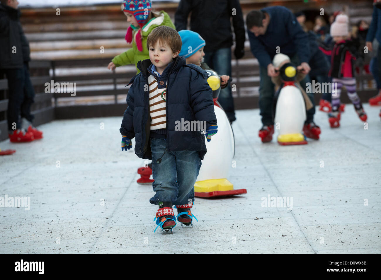 Skating on the outdoor ice rink, in the Elf village. Lapland UK, Bewl