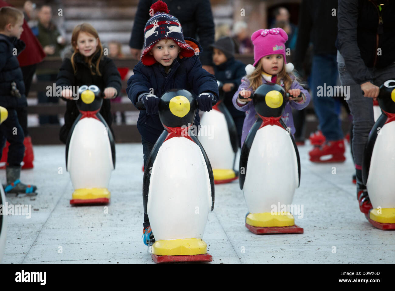 Skating on the outdoor ice rink, in the Elf village. Lapland UK, Bewl Water, Kent, December 1