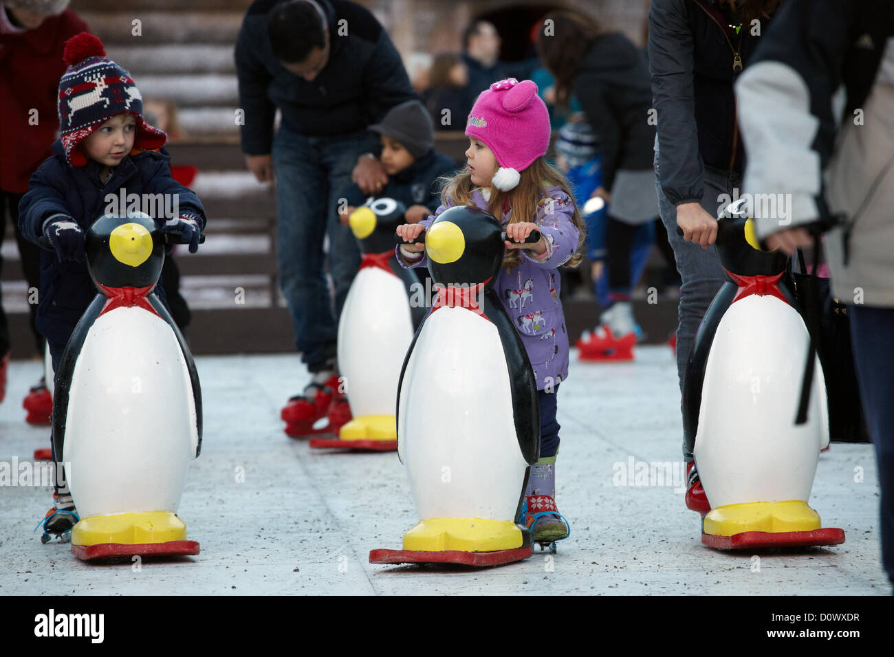 Skating on the outdoor ice rink, in the Elf village. Lapland UK, Bewl Water, Kent, December 1