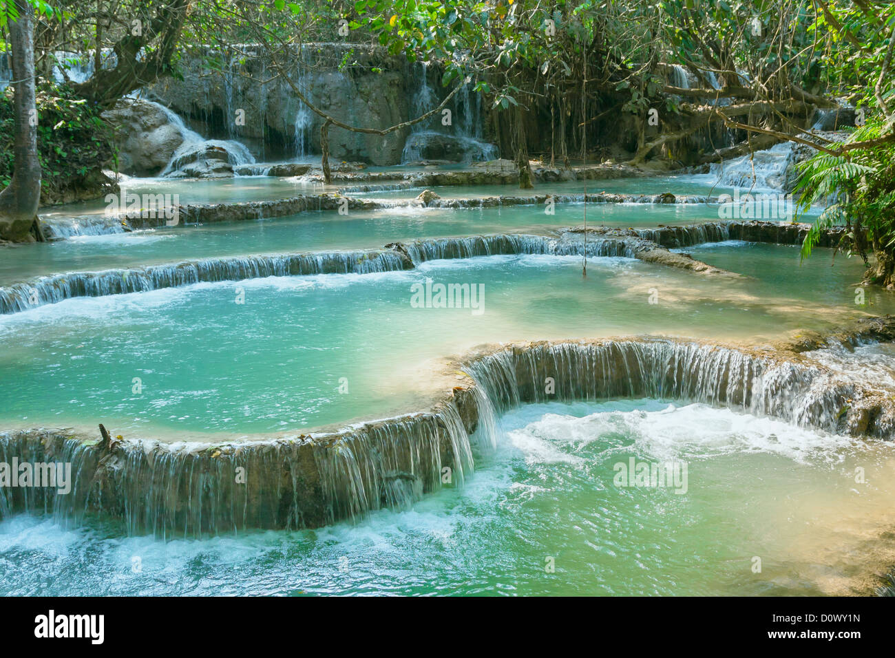 Pool and waterfall in the Tat Kuang Si waterfall system near Luang Prabang in Laos Stock Photo