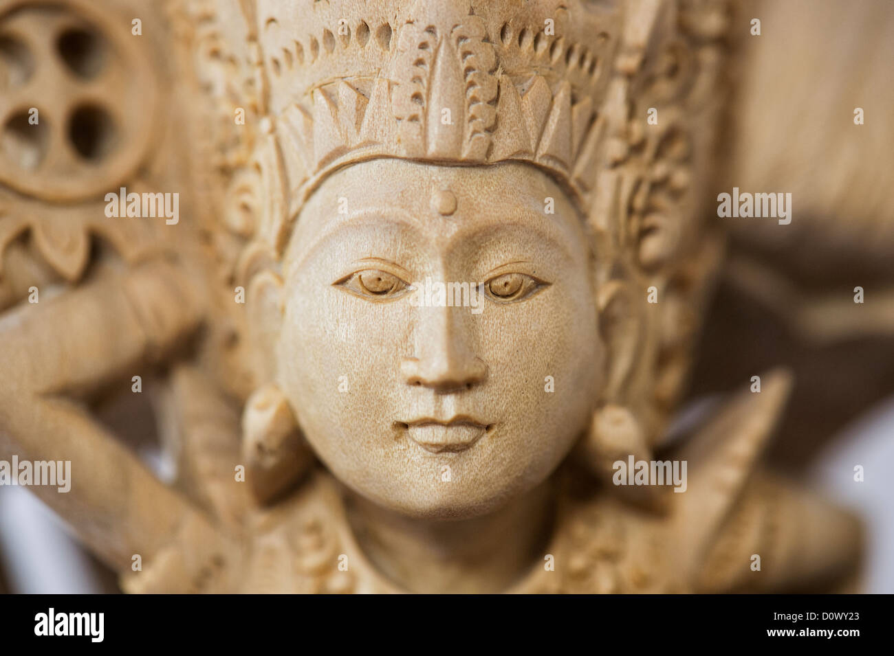 Hand carved Vishnu, Garuda, Nagas wooden statue from Bali Stock Photo