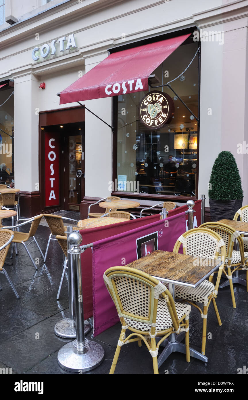 Glasgow empty chairs rain soaked tables cafe eating outdoor hires