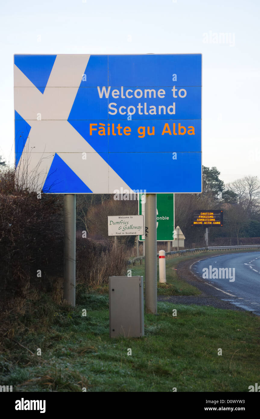 Welcome to Scotland road signpost with Gaelic writing on the border with England in the UK. Europe Stock Photo