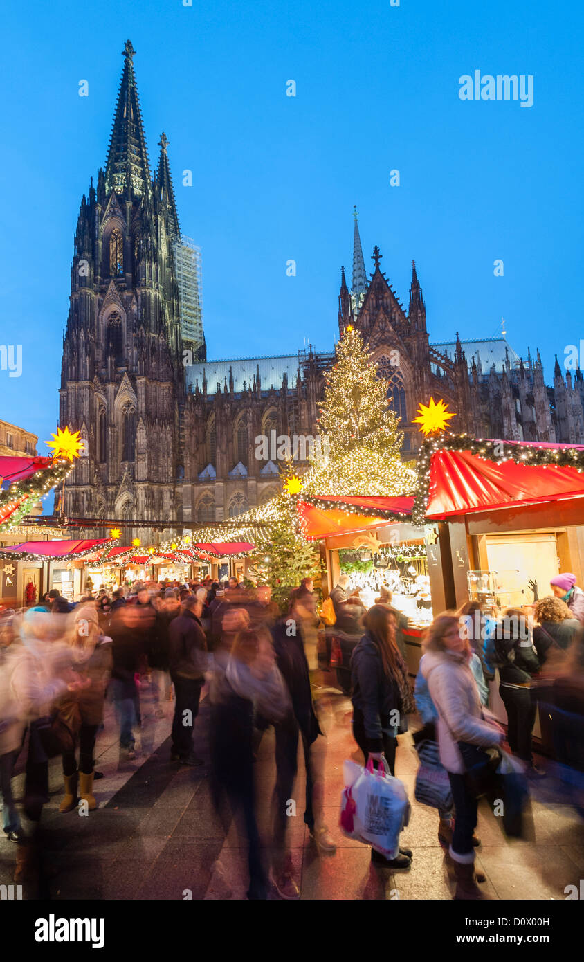 Busy Cologne Christmas Market at at night the Cathedral in winter Germany Stock Photo