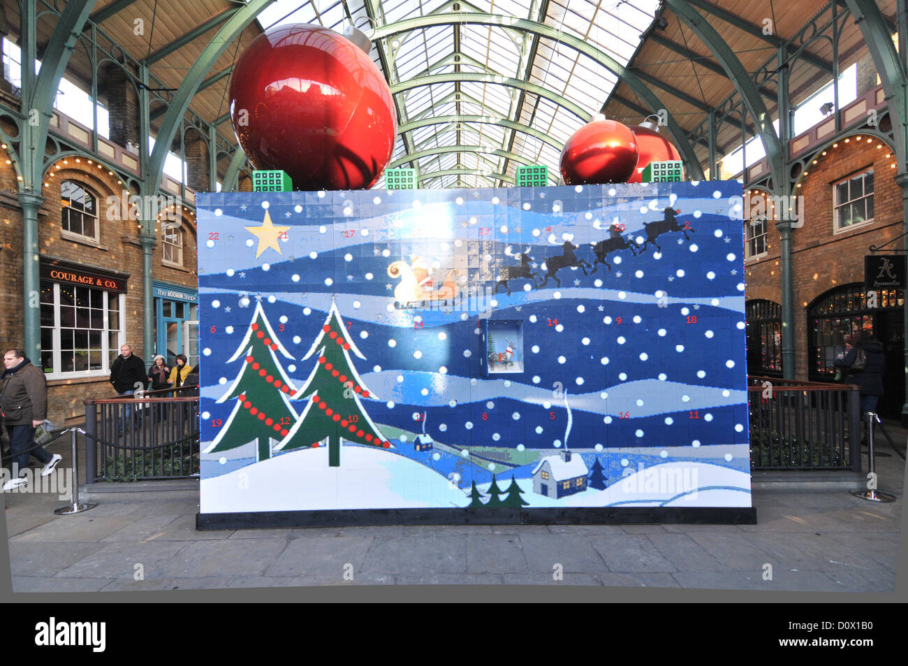 Covent Garden, London, UK. 2nd December 2012. The first door is opened on the Lego Advent Calendar. A giant Lego Advent Calendar in Covent Garden, built by Duncan Titmarsh from 600,000 bricks. Stock Photo
