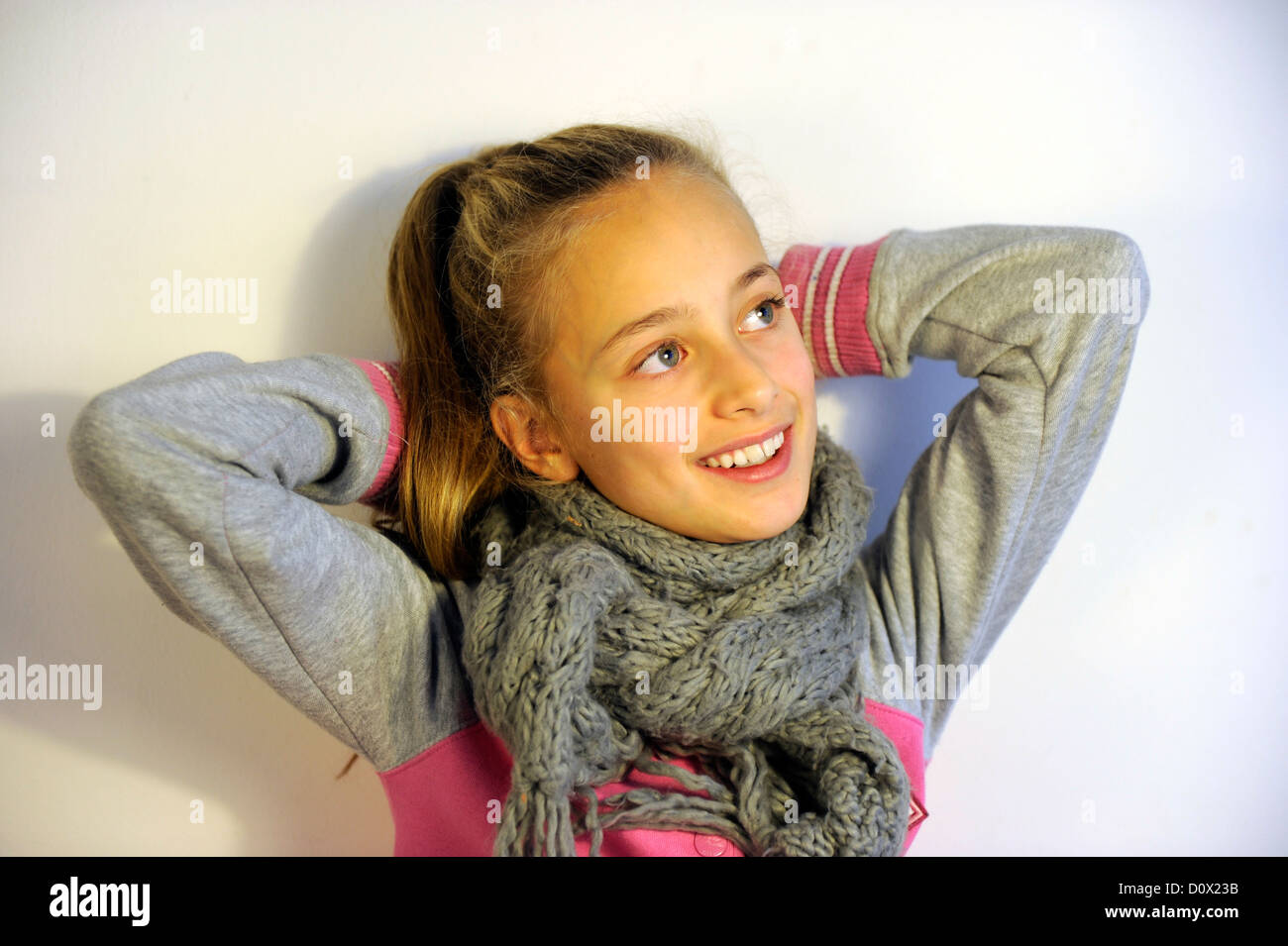 Girl of ten years beeing happy and satisfied. Stock Photo