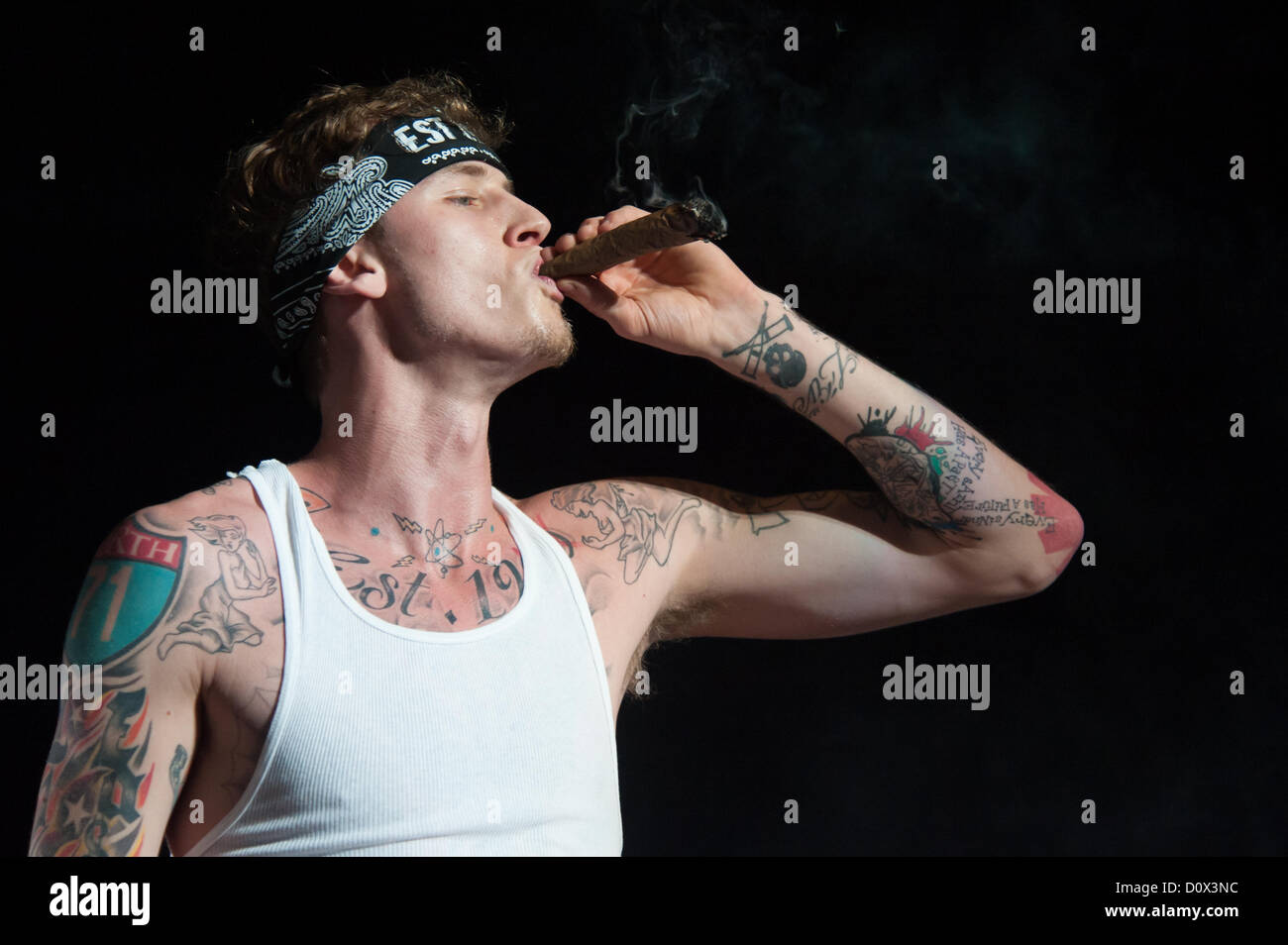 SACRAMENTO, CA – December 1: Machine Gun Kelly performs in Rick Ross’ MMG Tour featuring Meek Mill and Wale Folarin at Sleep Train Arena in Sacramento, California on December 1, 2012. Stock Photo