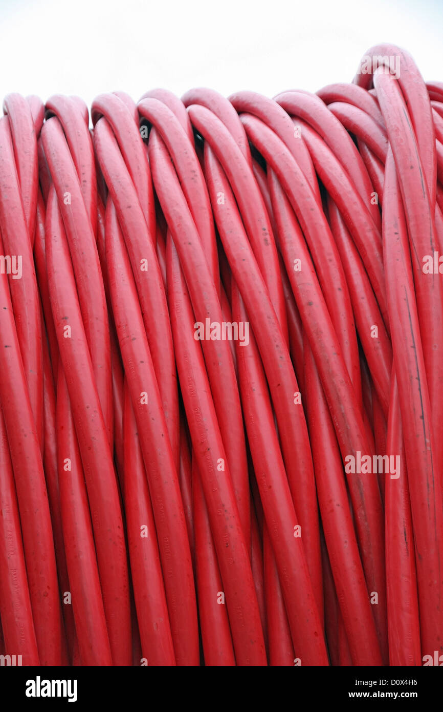 Red detail detailed pipes and electric wires between coils Stock Photo