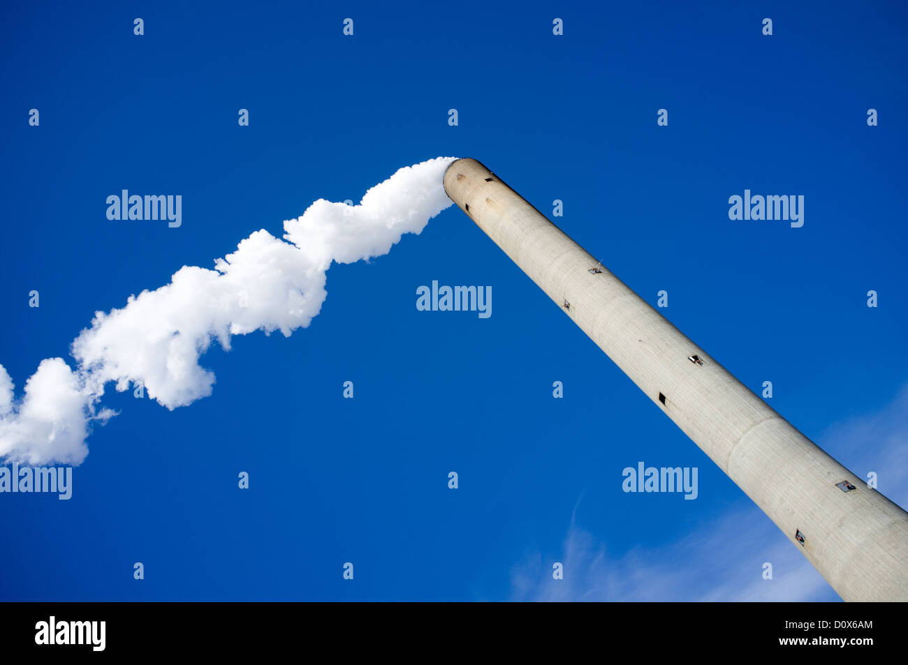 Water vapor coming out of an isolated power plant's smokestack , Finland Stock Photo