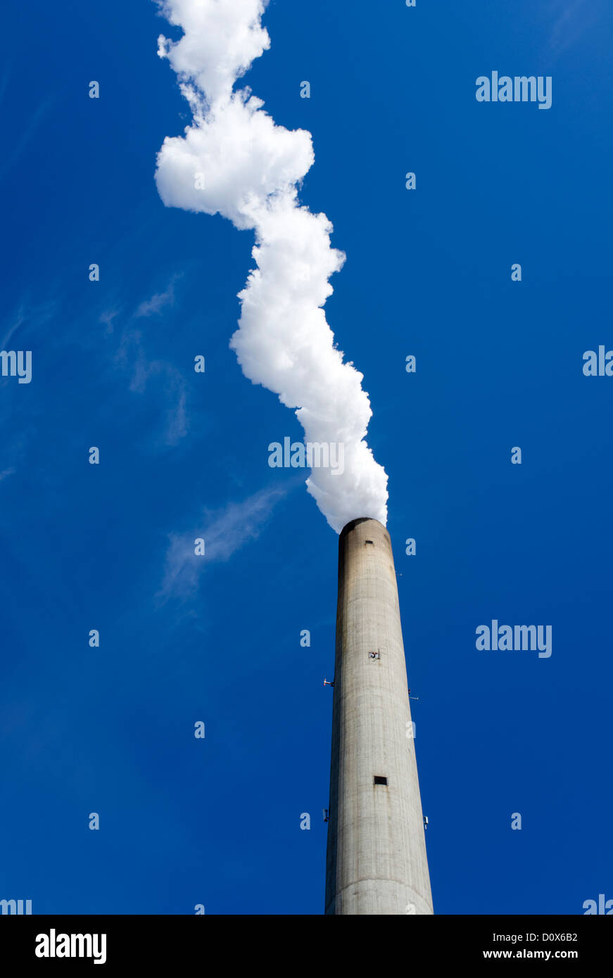 Water vapor coming out of an isolated power plant's smokestack , Finland Stock Photo