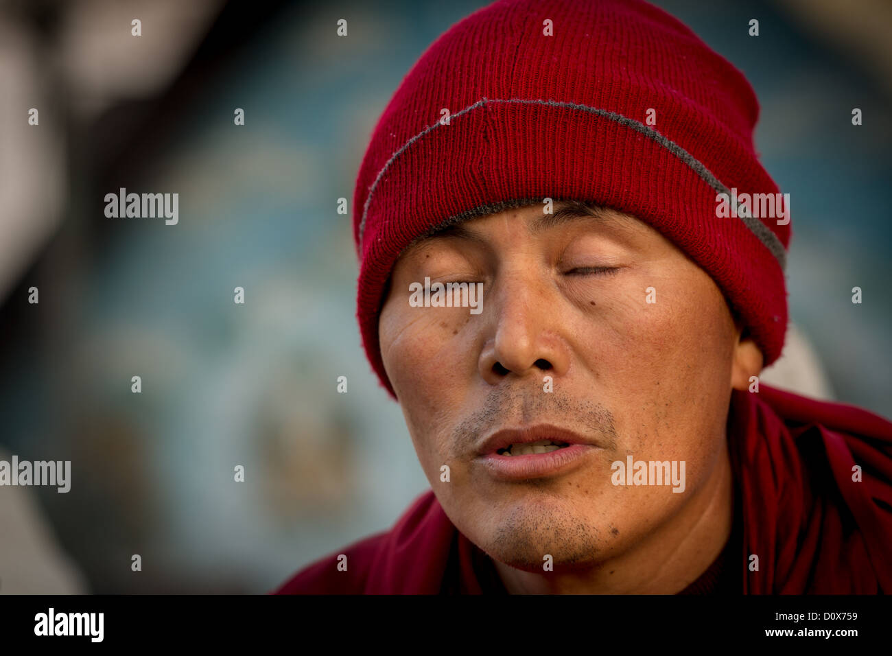 Buddhist monk at Boudnath stupa, Boudnath, Kathmandu, Nepal Stock Photo