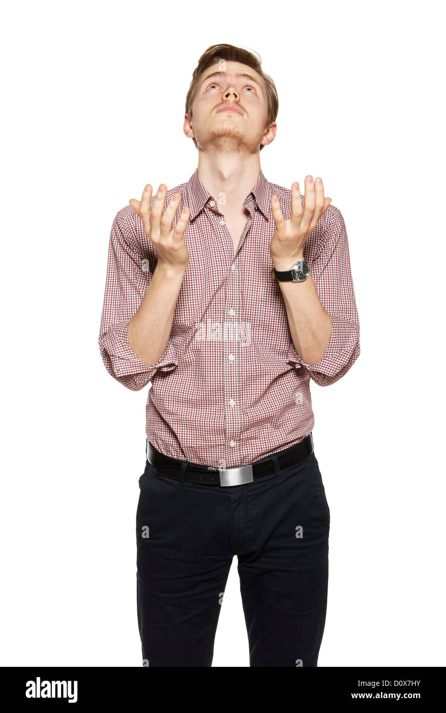 Studio shot of young man against a white background Stock Photo - Alamy