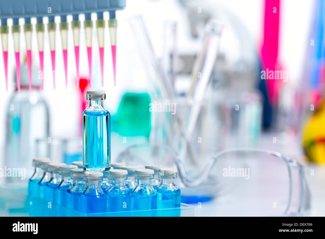 Chemical scientific laboratory multi channel pipette and test tubes Stock Photo