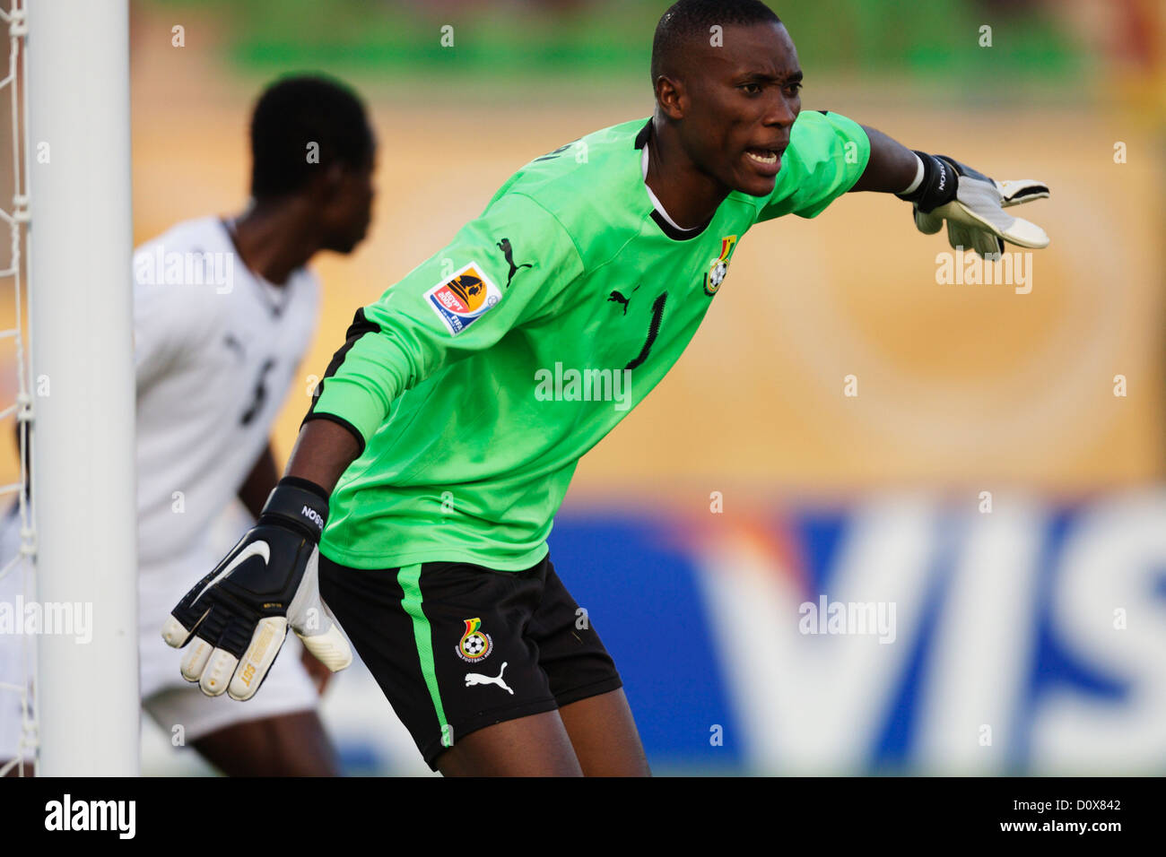 Goalkeeper Daniel Agyei of Ghana directs his defenders during a 2009 FIFA U-20 World Cup quarterfinal match against South Korea. Stock Photo