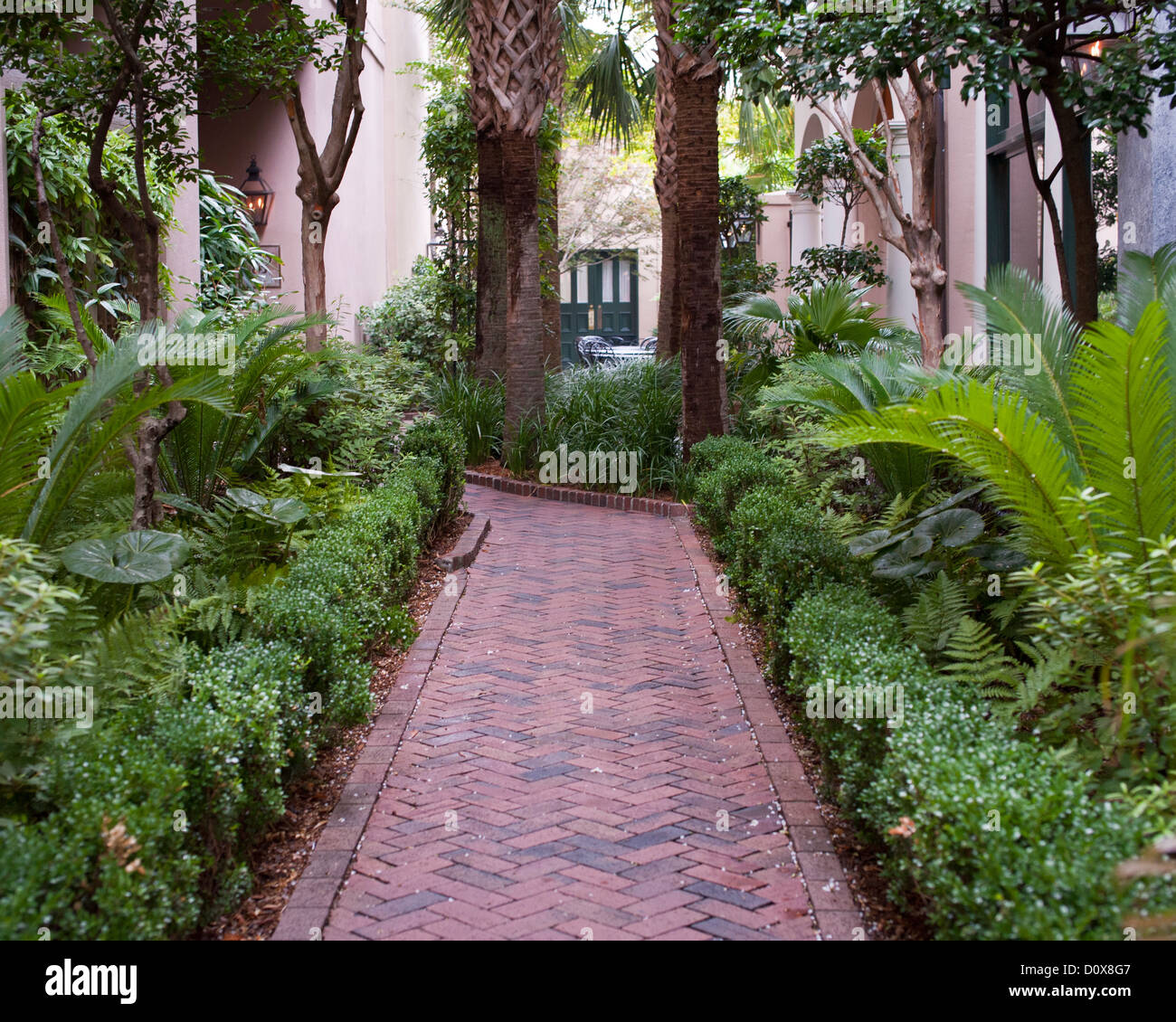 Brick paved path leading to exclusive restaurant, Charleston Stock