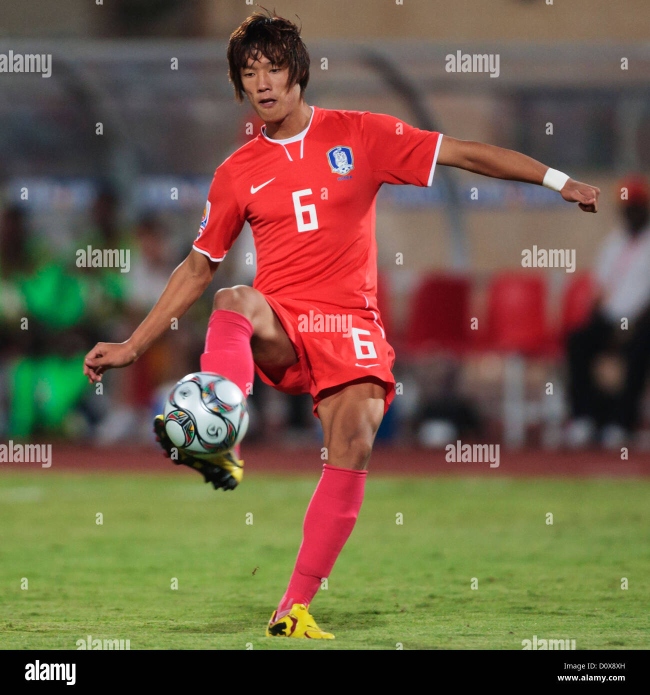 Jeong Ho Hong of South Korea kicks the ball during the 2009 FIFA U-20 World Cup quarterfinal match against Ghana. Stock Photo