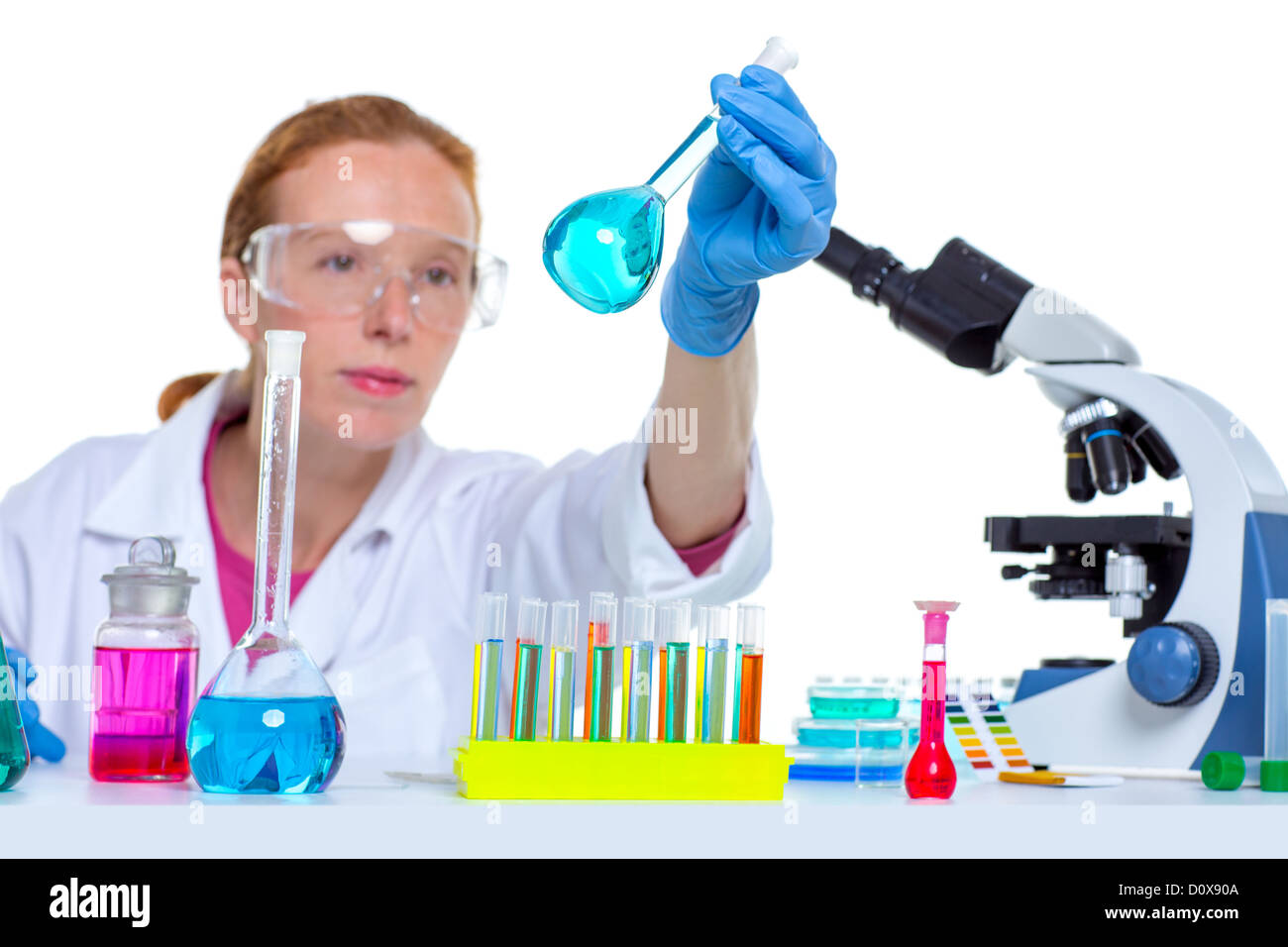 chemical laboratory scientist woman working with glass flask Stock