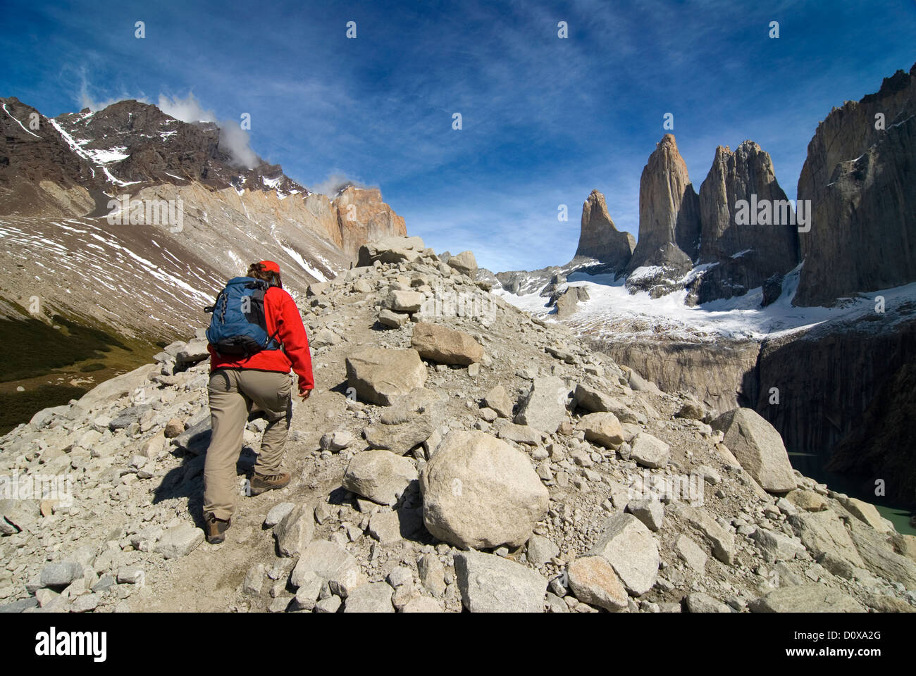 Woman hiking on a moraine below Torres Del Paine, Torres Del Paine ...