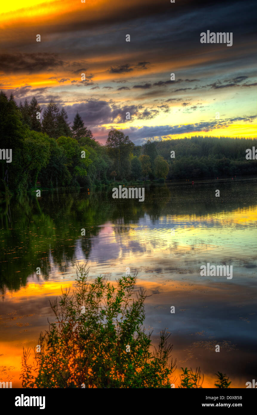 Sunset at Shear Water Lake, Crockerton, near Warminster, Wiltshire Southwest England UK Stock Photo