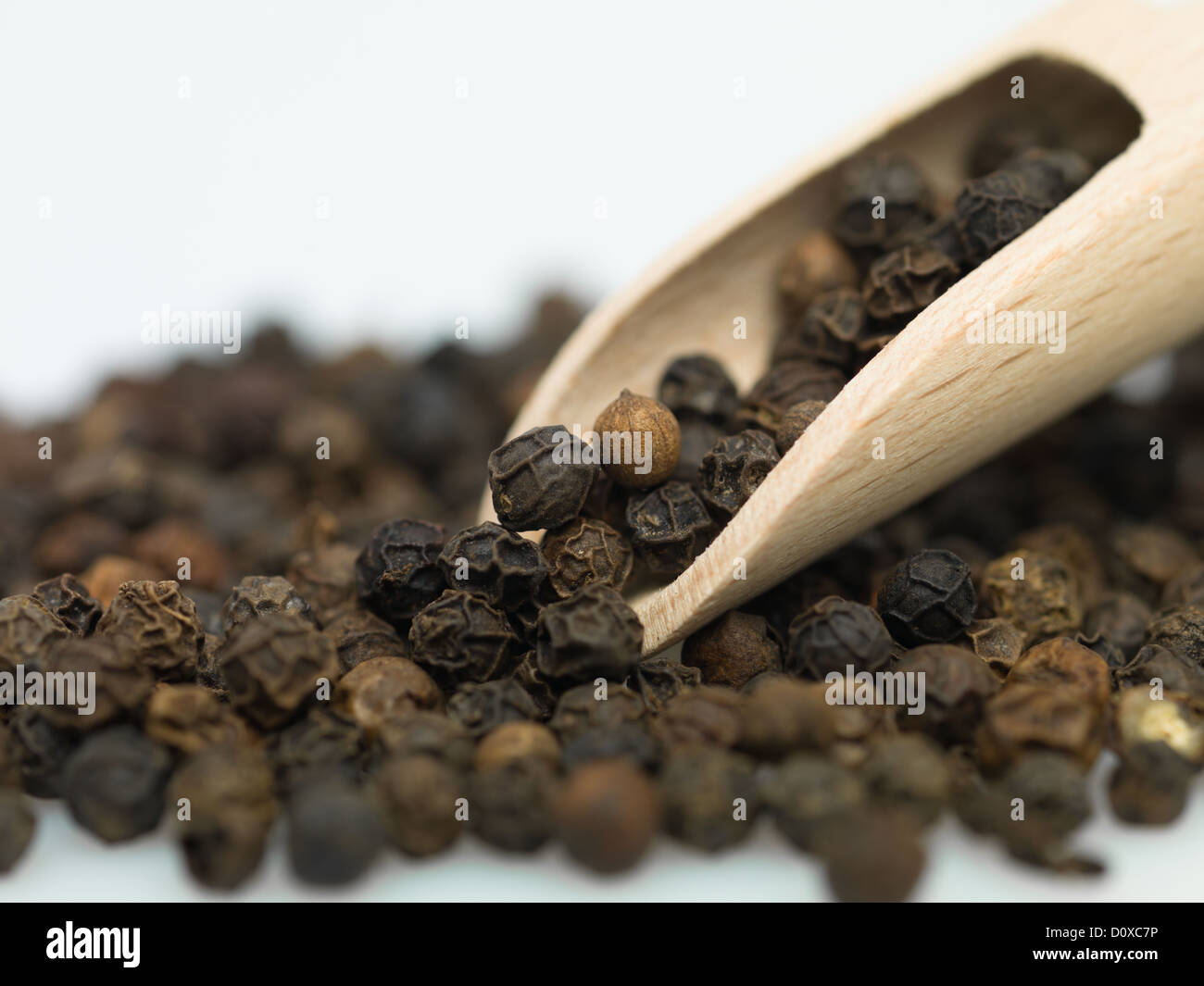 pepper tablespoon brown with white background Stock Photo Alamy