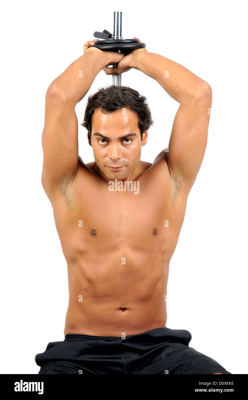 Young fitness man exercising with dumbbells isolated in white Stock Photo