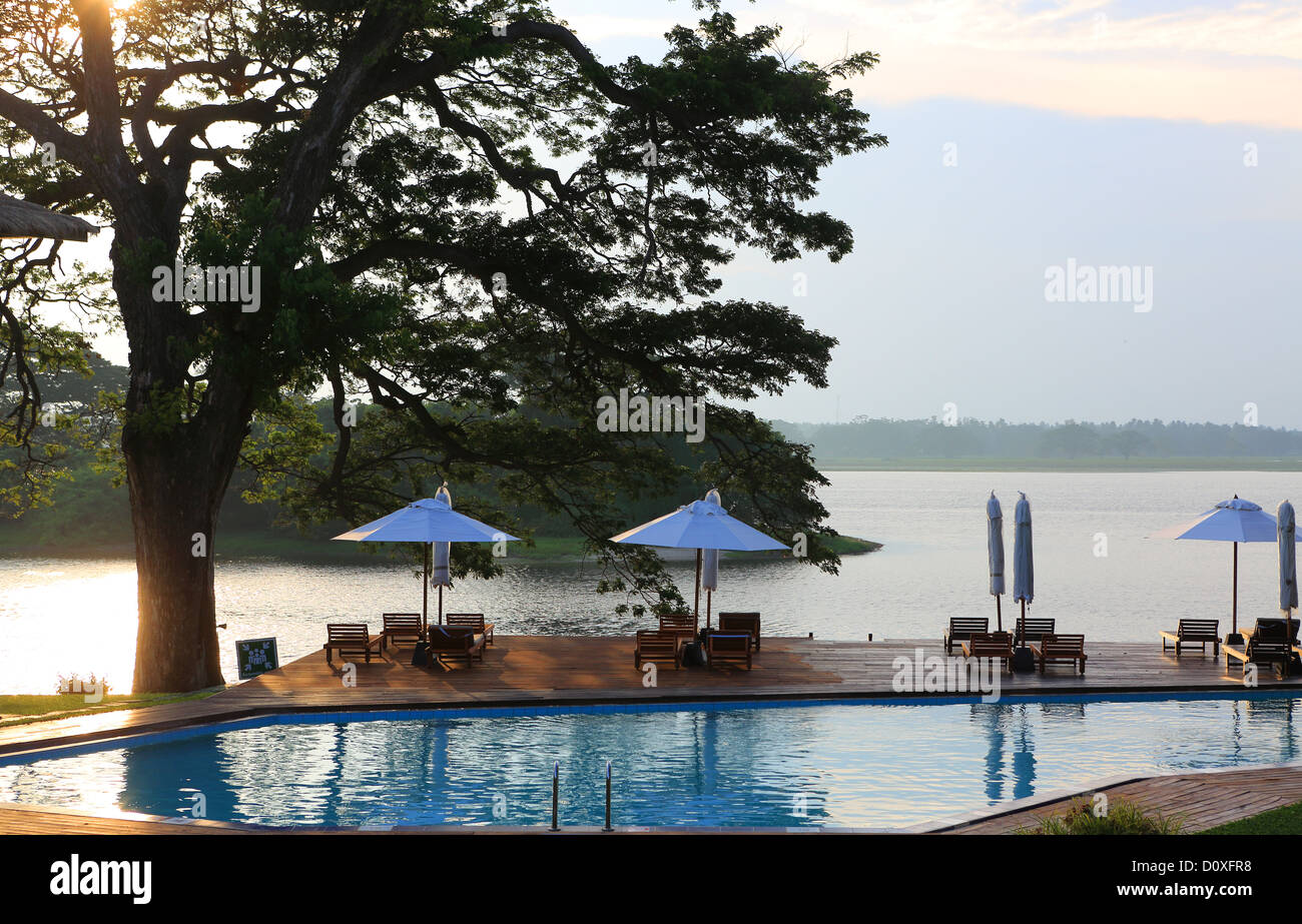 Luxury resort hotel swimming pool in front of Tissa wewa lake at