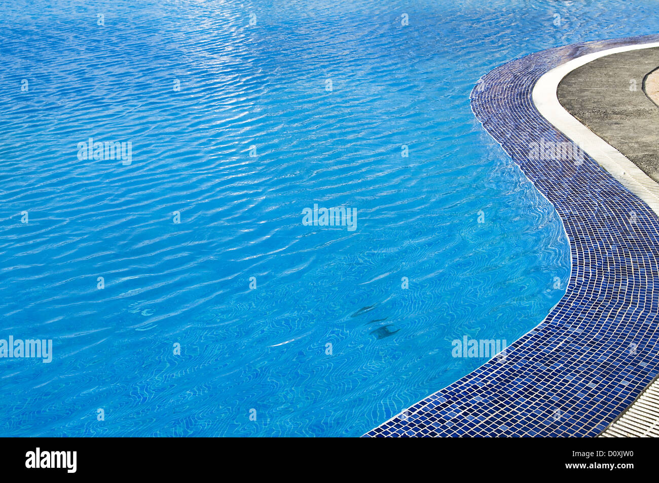 Pool edge. Beautiful blue water texture Stock Photo
