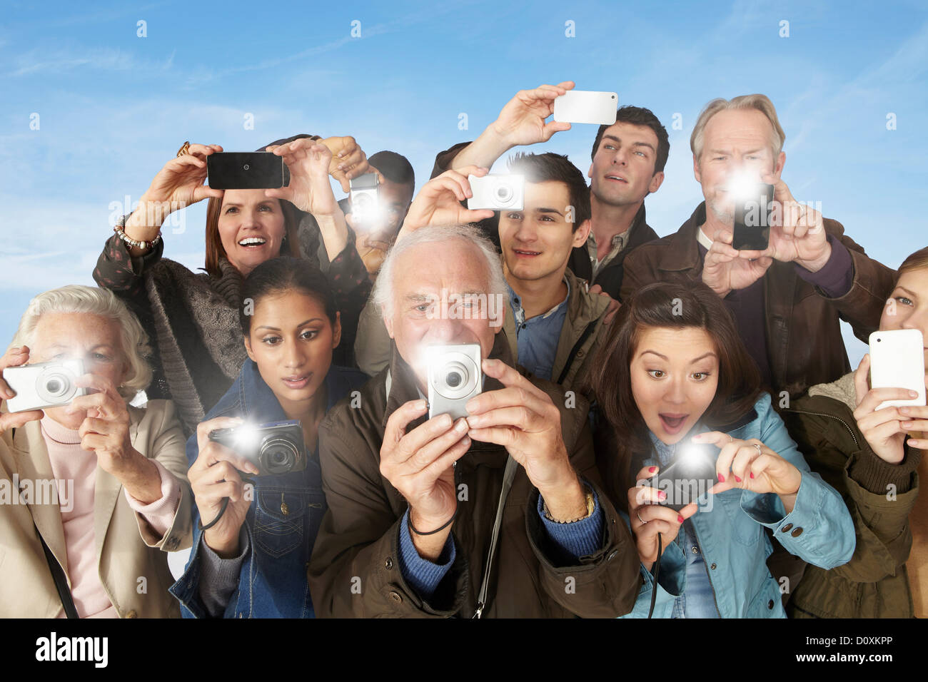 Group of people taking photographs Stock Photo