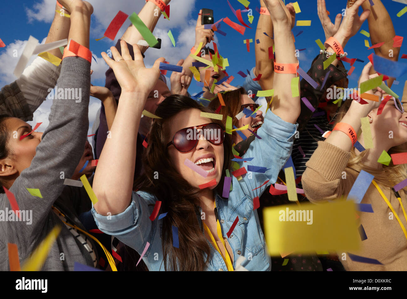 People cheering at a music festival Stock Photo