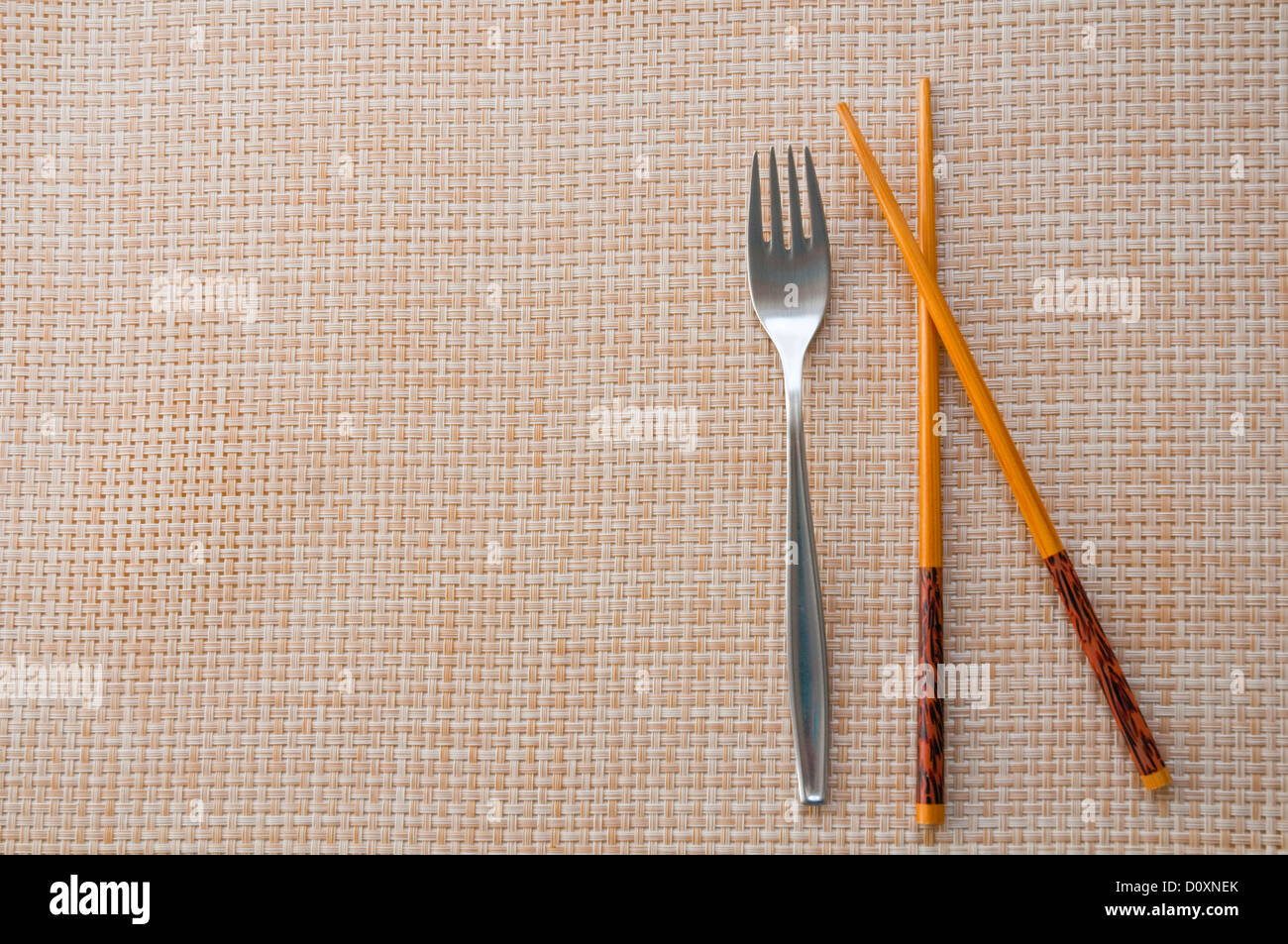 Fork and chopsticks. Stock Photo