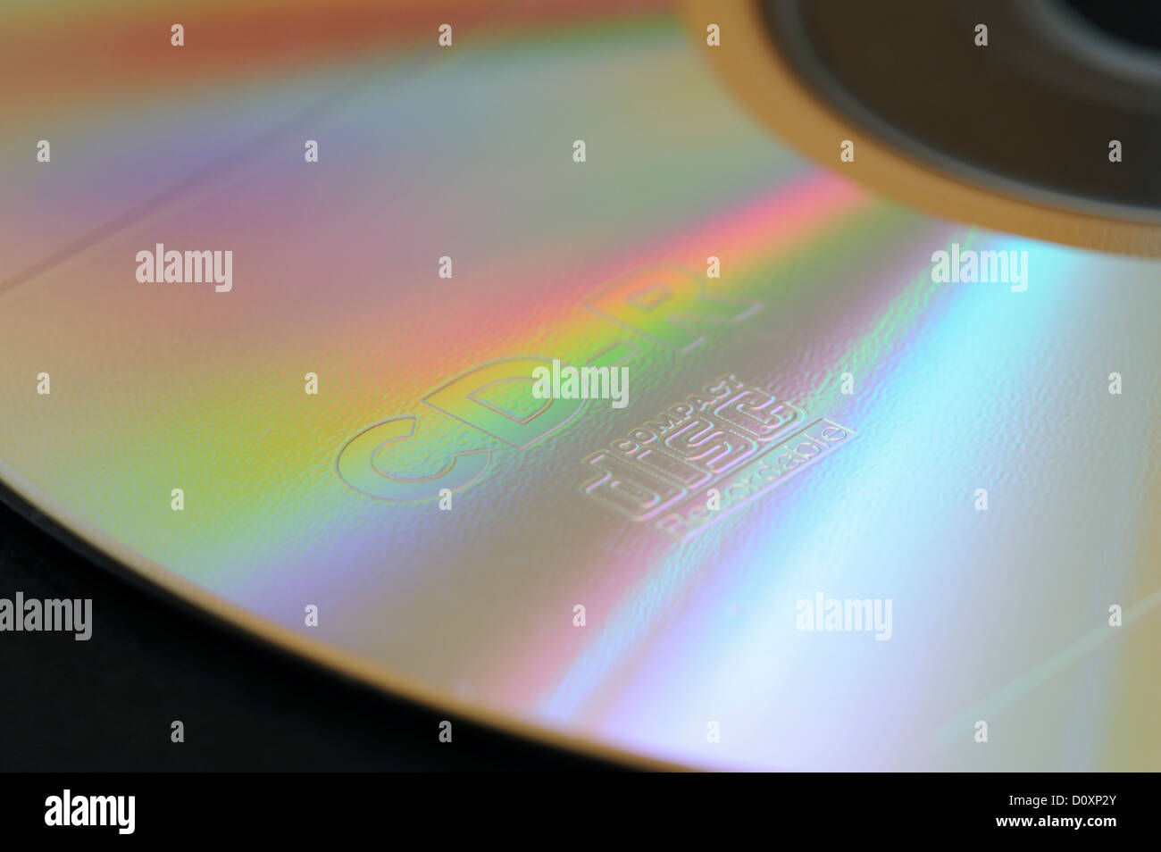 close-up of a shiny compact disc CD-R with spectral colors Stock Photo