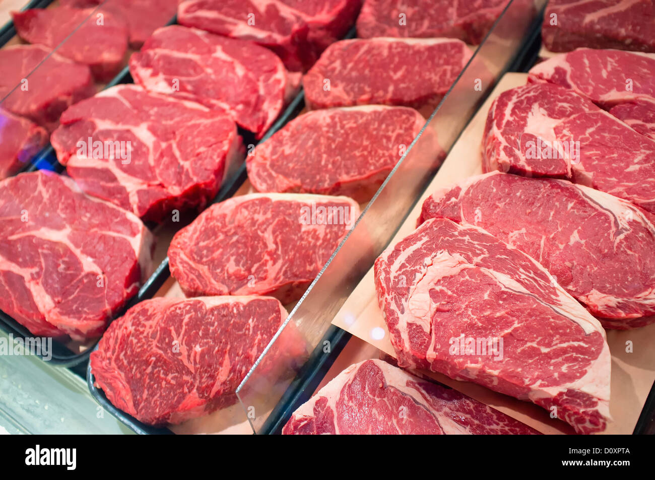 Fresh meat steak sale display at american supermarket Stock Photo - Alamy