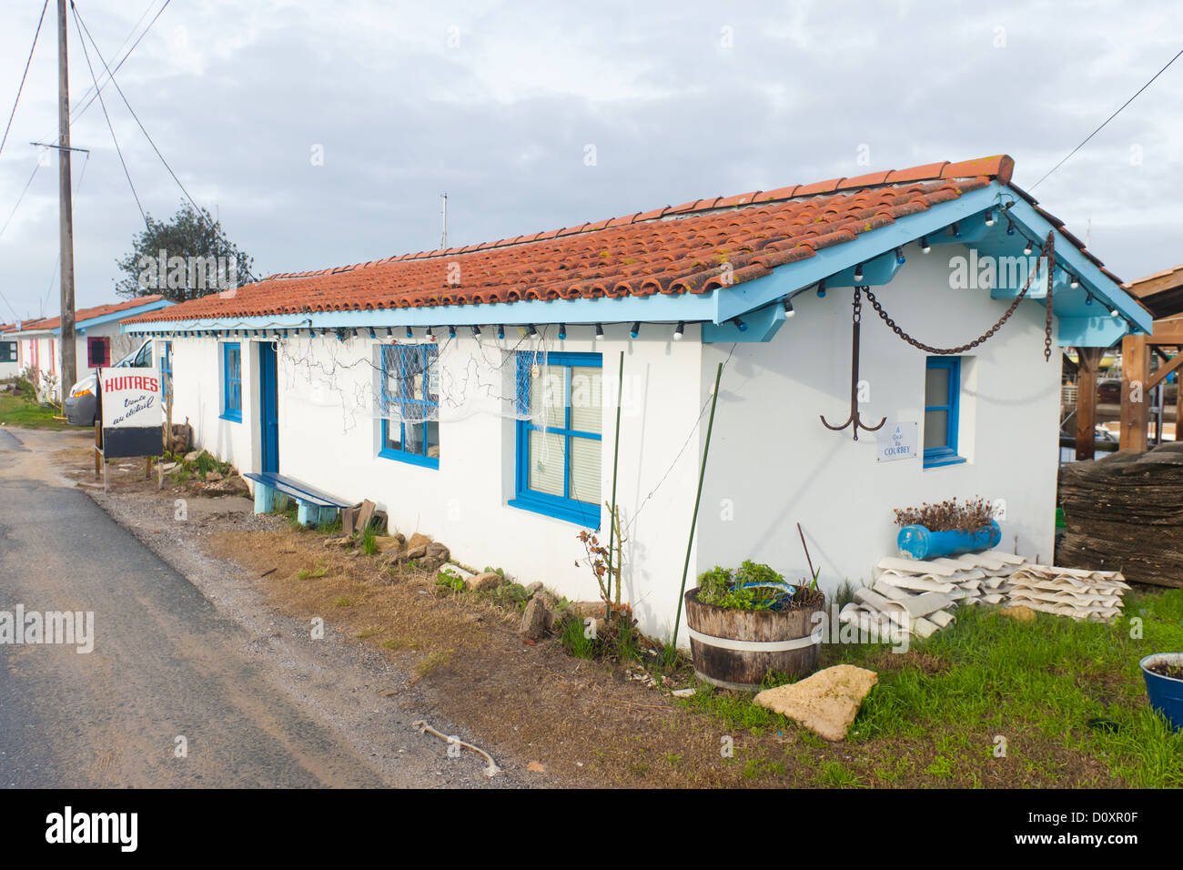 "Oysters for sale". Little house where oysters are stored and packaged for sale Stock Photo