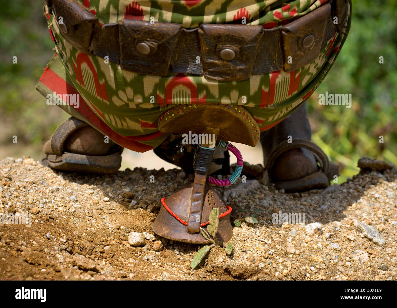Rear View Of The Belt Of A Banna Tribe Warrior Sitting On A Headrest, Turmi, Omo Valley, Ethiopia Stock Photo