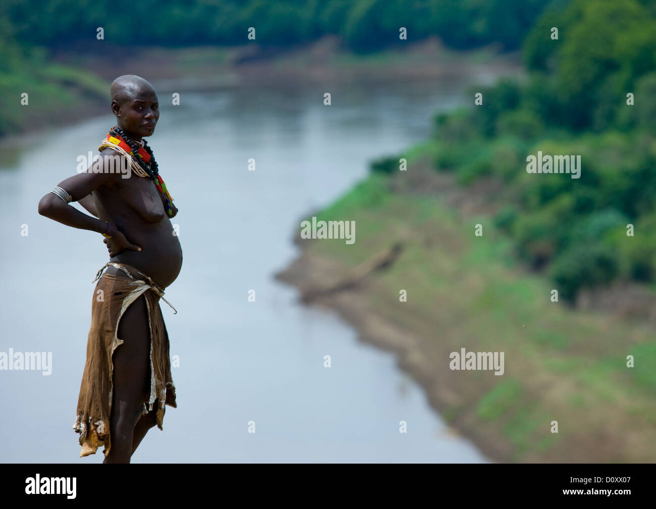 Portrait Of A Pregnant Woman From Karo Tribe Over The Omo River Korcho Village Omo Valley
