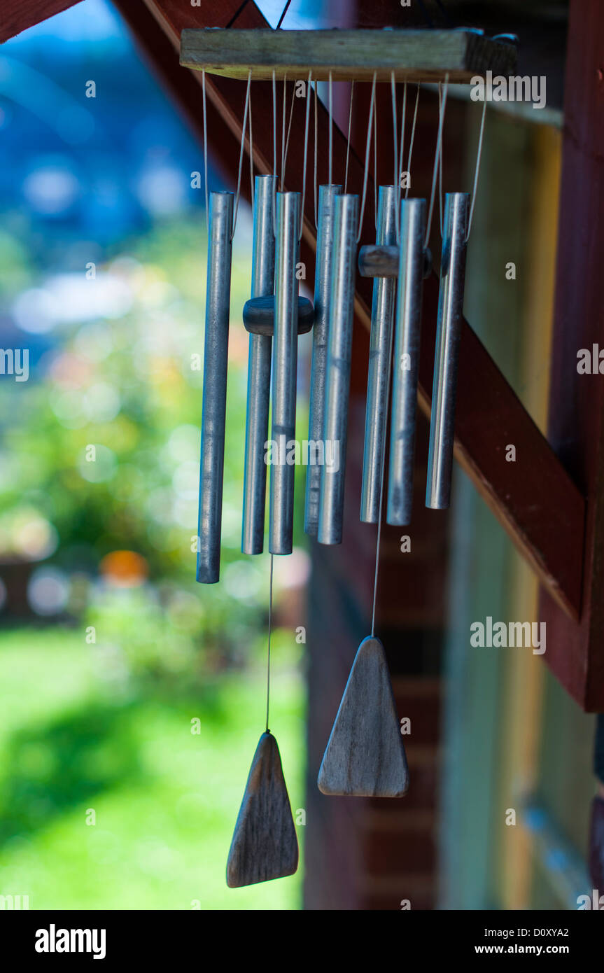 Teignmouth, Devon, England.July 23rd 2012. Wind Chimes hanging from a garden door. Stock Photo