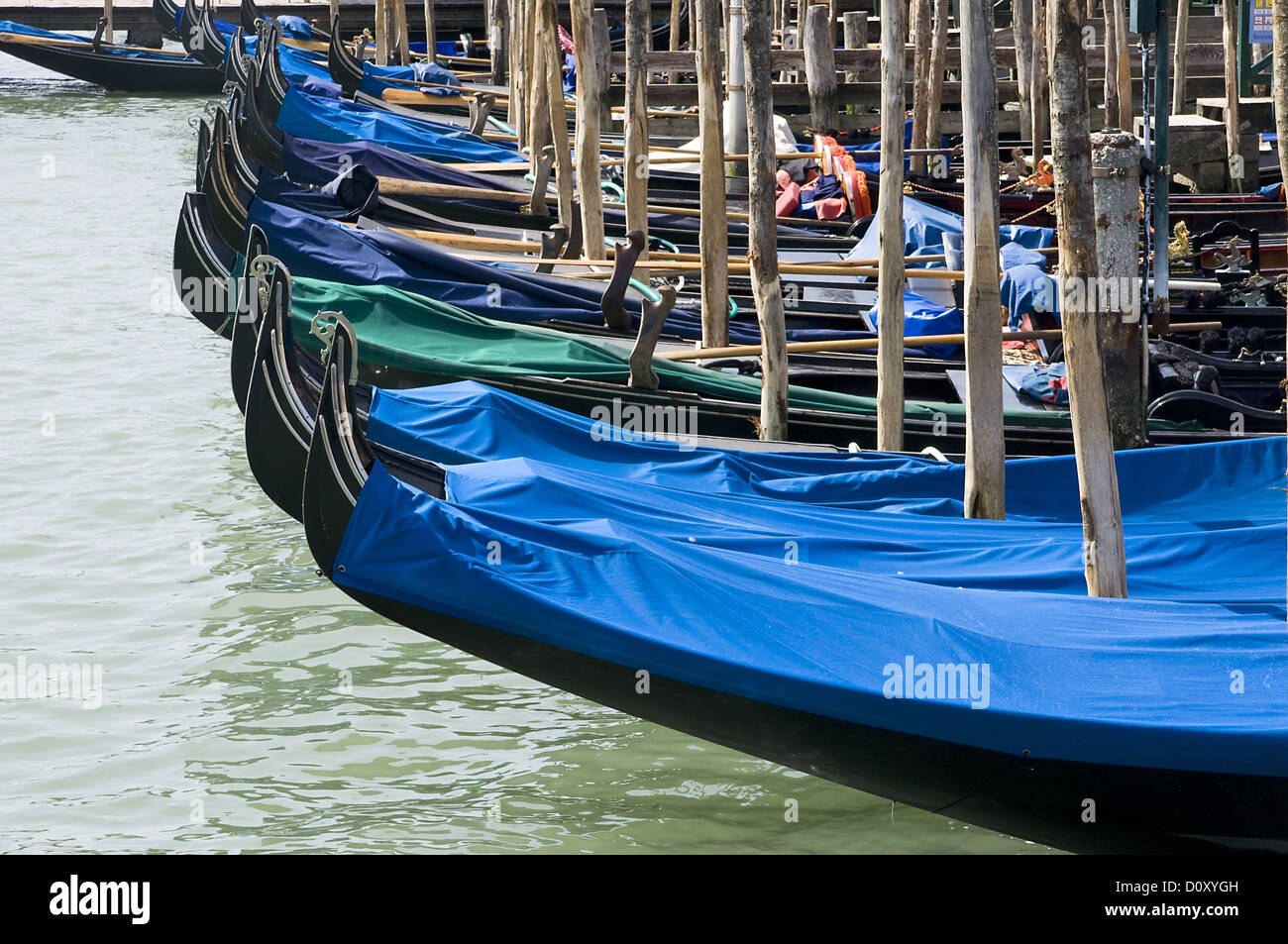 Many parked famous gondolas in Venice Stock Photo - Alamy