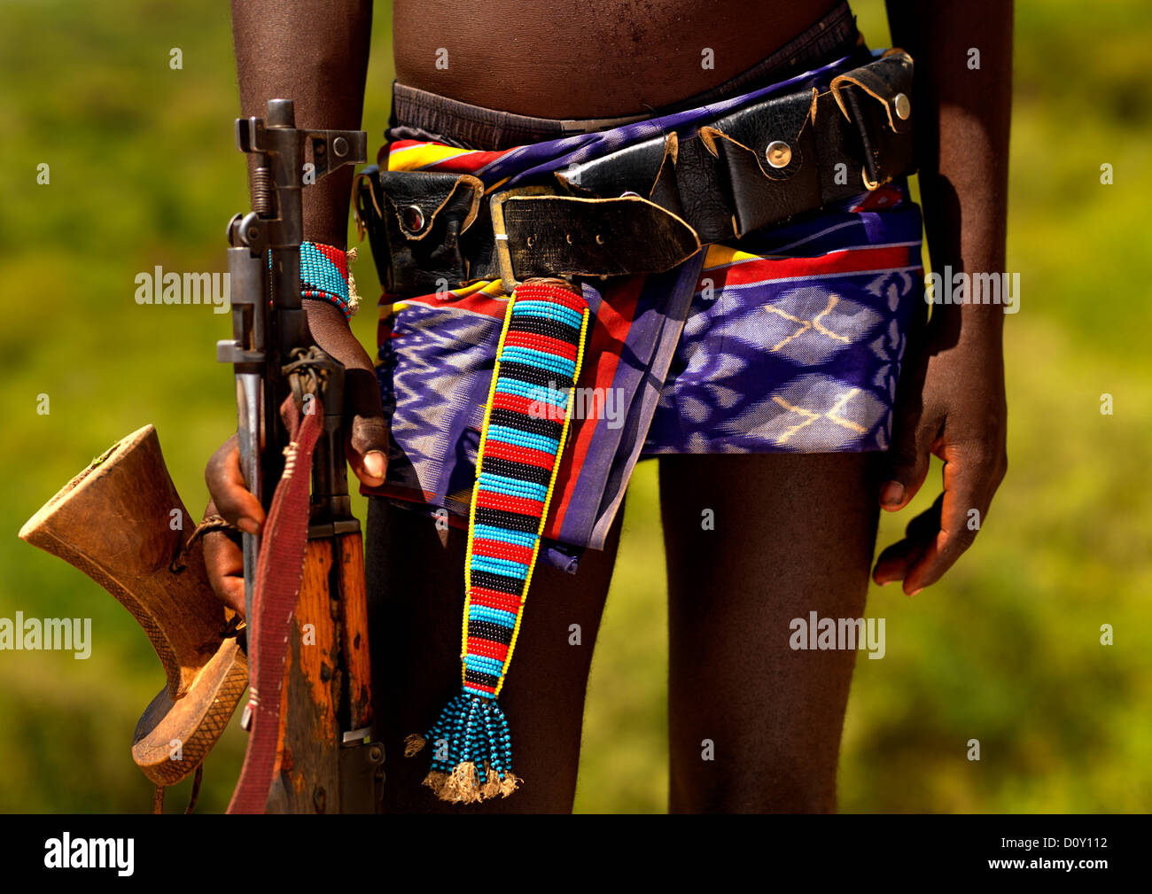 Detail Of The Belt Of A Banna Tribe Warrior With Headrest And Kalashnikov, Omo Valley, Ethiopia Stock Photo