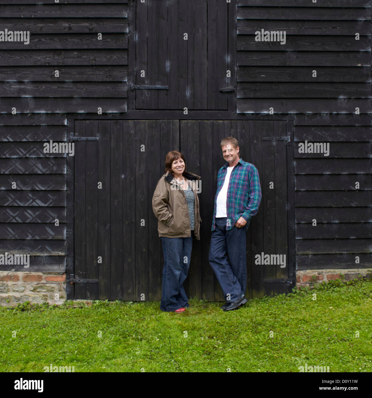 Jane Farringdon and Rob outside the barn Stock Photo