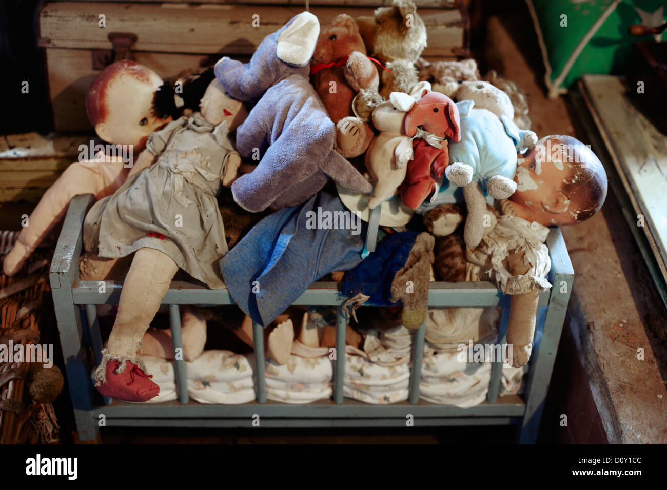 Jumbled collection of old dolls and toys Stock Photo - Alamy