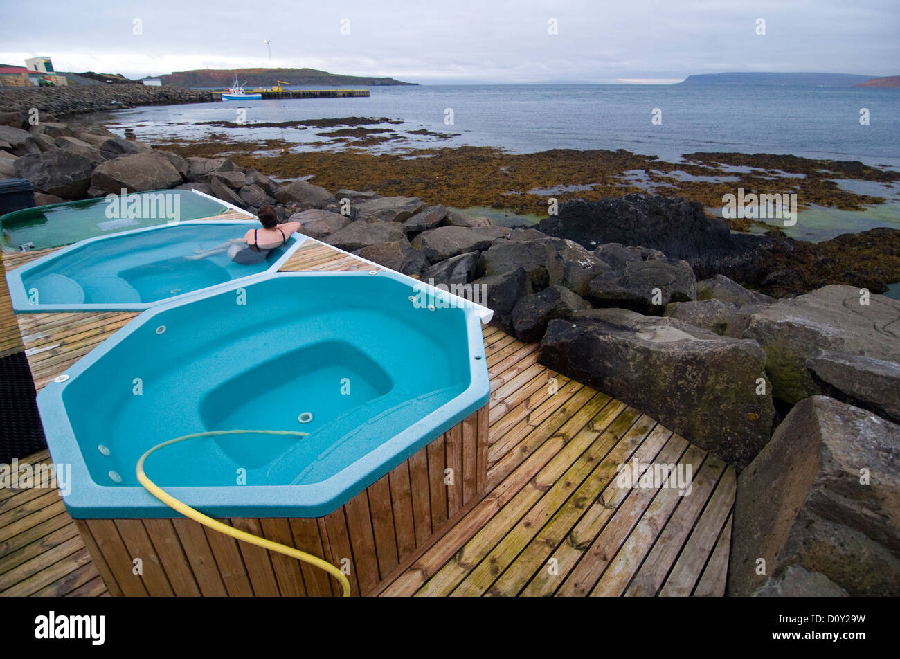 Midnight bathing in the outside spa at Drangsnes Stock Photo Alamy