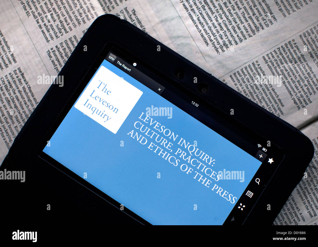 The Leveson Report on press ethics on a tablet device, London Stock Photo