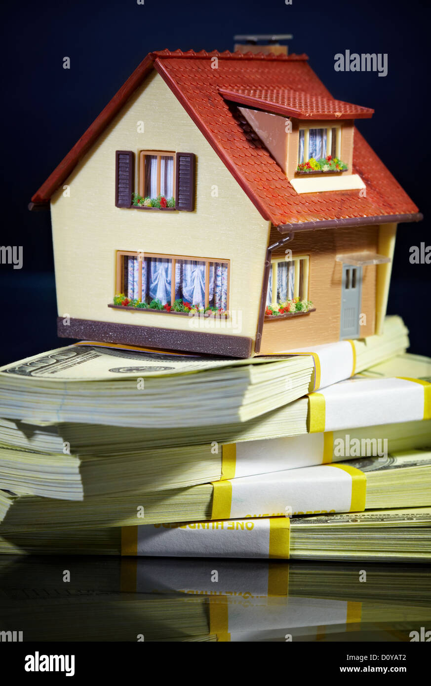 house on packs of banknotes Stock Photo - Alamy