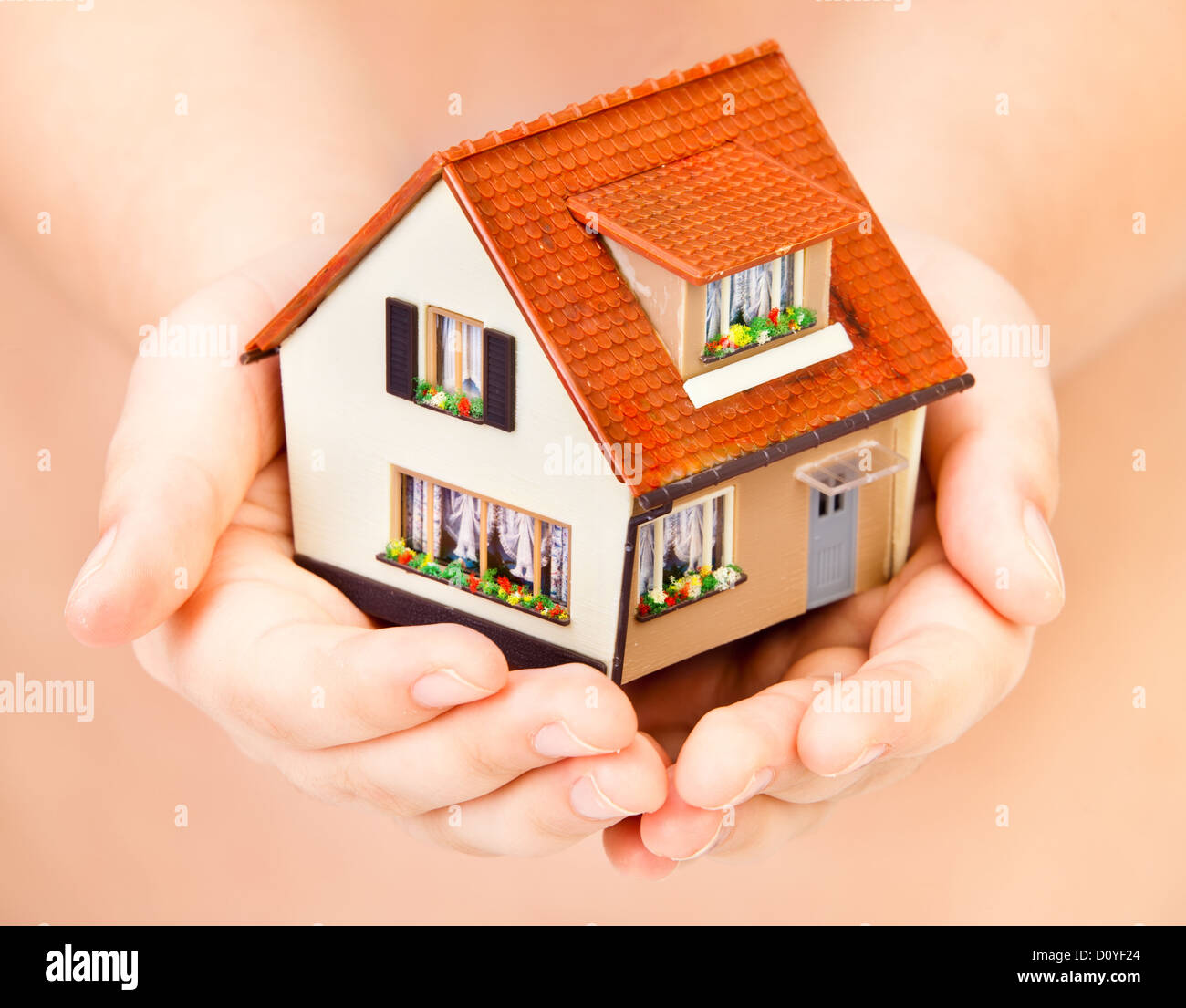 house in human hands Stock Photo