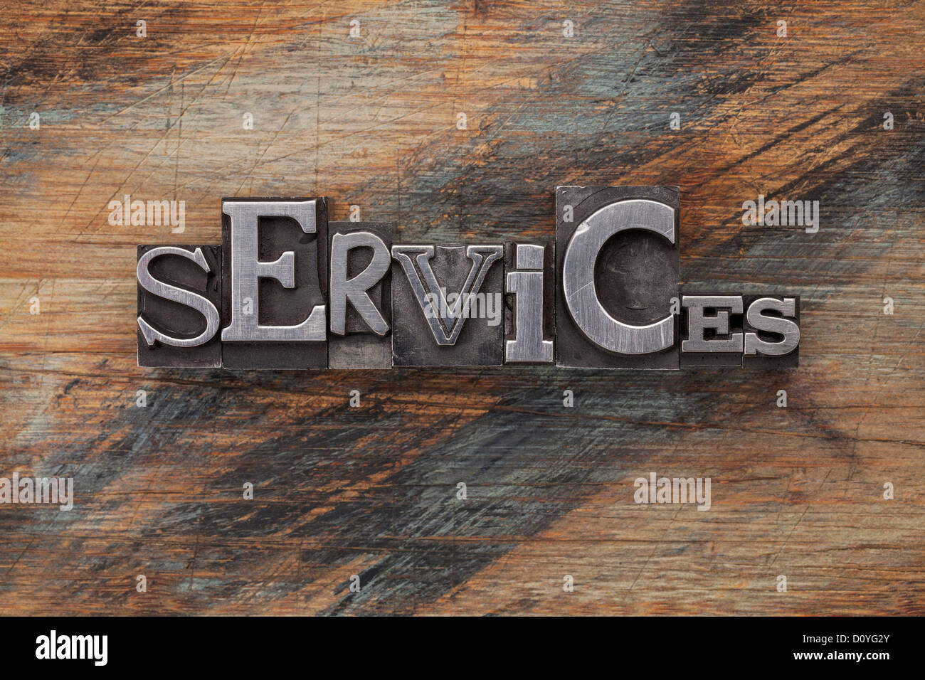services - word in vintage letterpress metal type blocks on a grunge painted wood Stock Photo