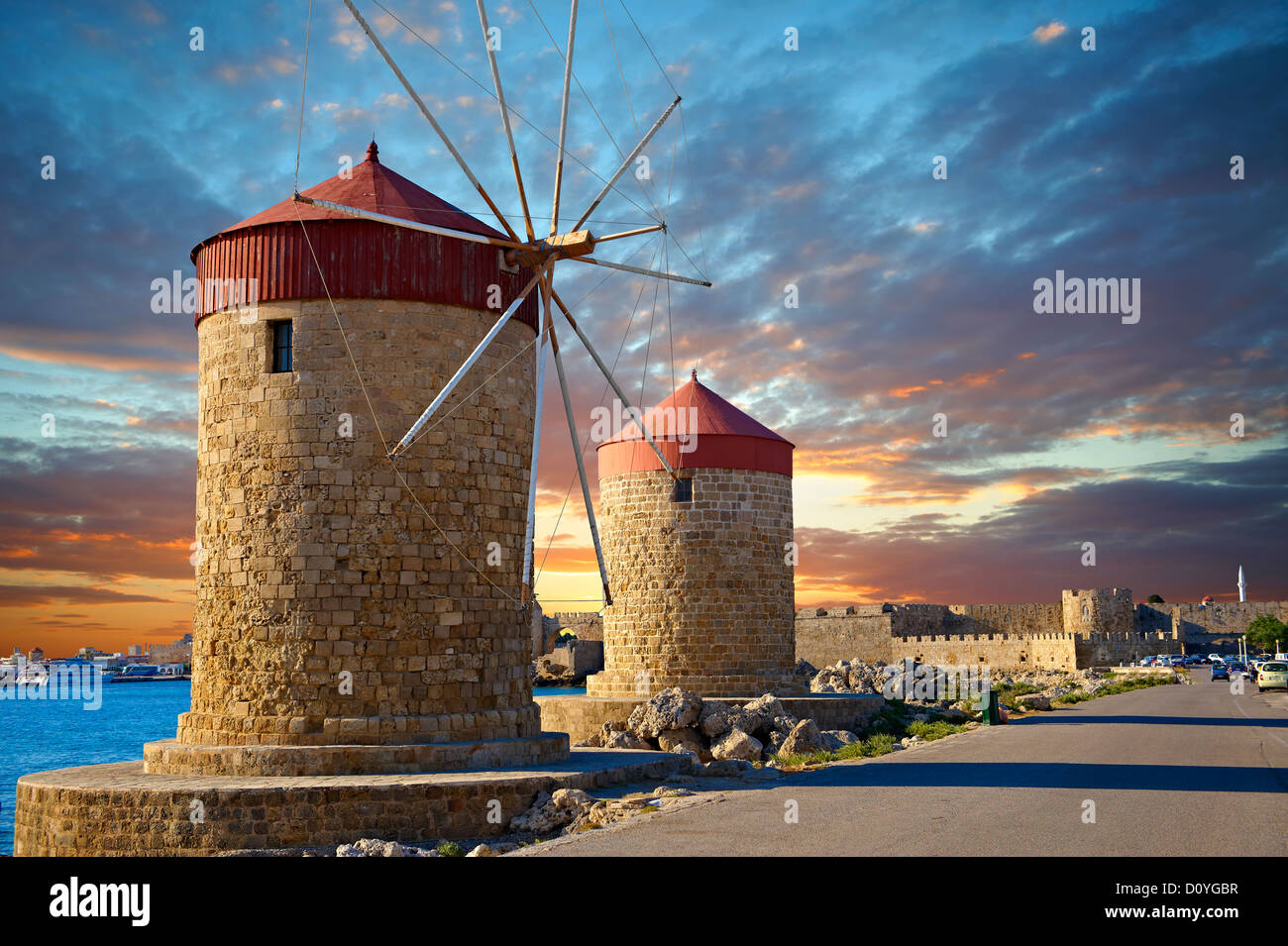 Windmills and walls of Rhodes, Greece. UNESCO World Heritage Site Stock Photo